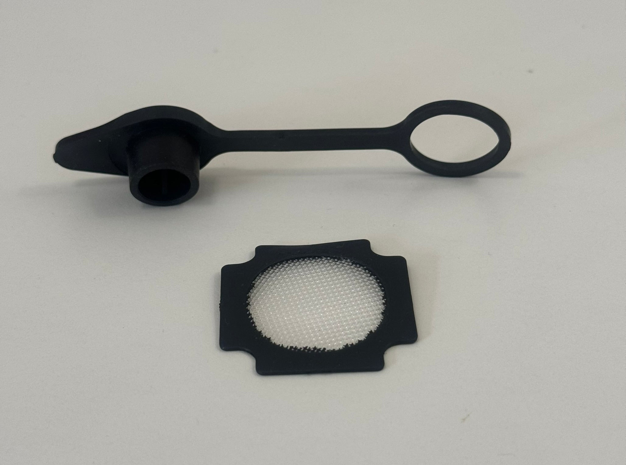 Fly screen and vent plug kit by Compo Closet Australia, showing mesh screen and vent plug components for window installation.