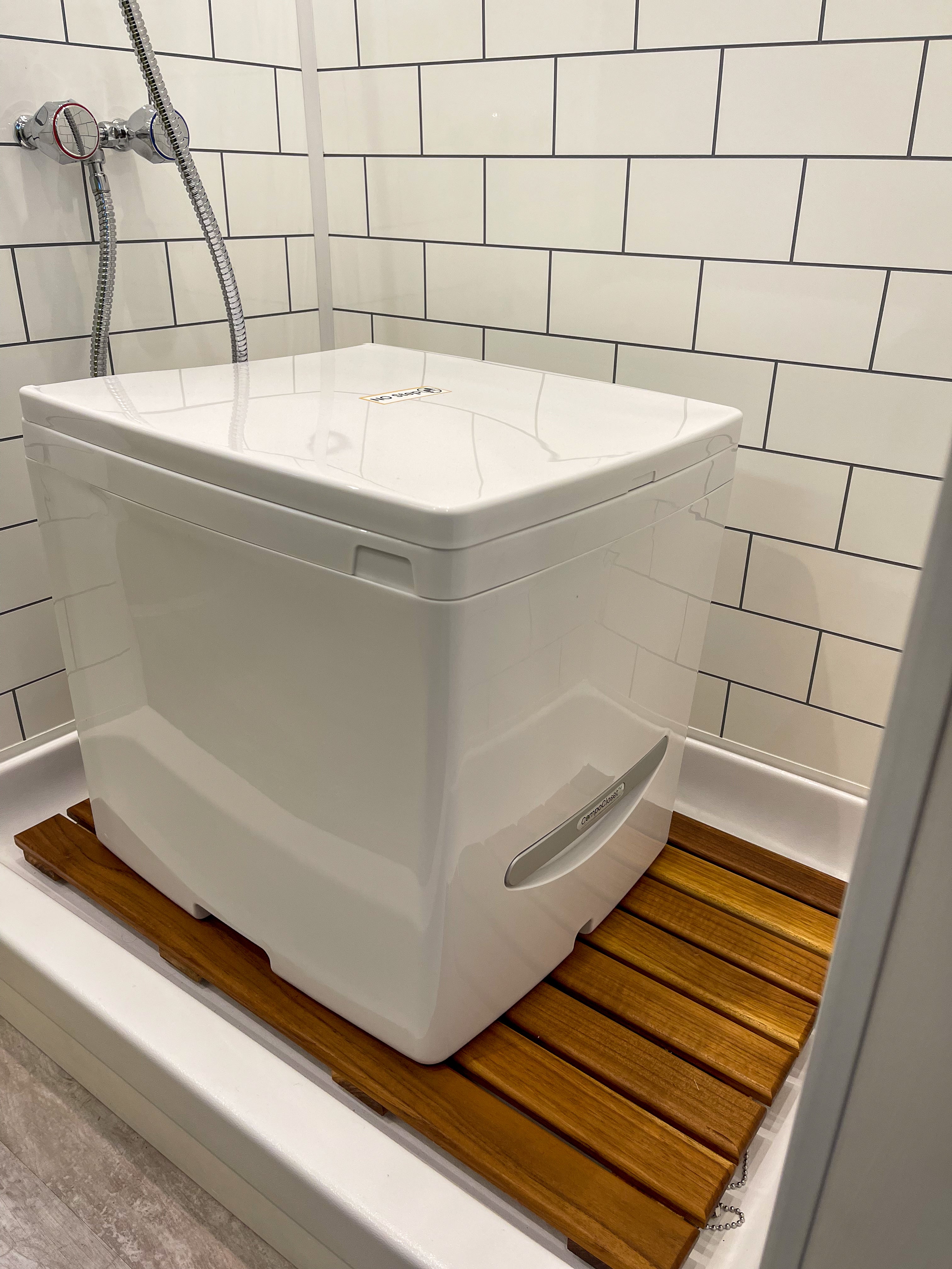 Portable Cuddy composting toilet by Compo Closet Australia, ideal for caravans and off-grid living, featuring a compact, eco-friendly design.