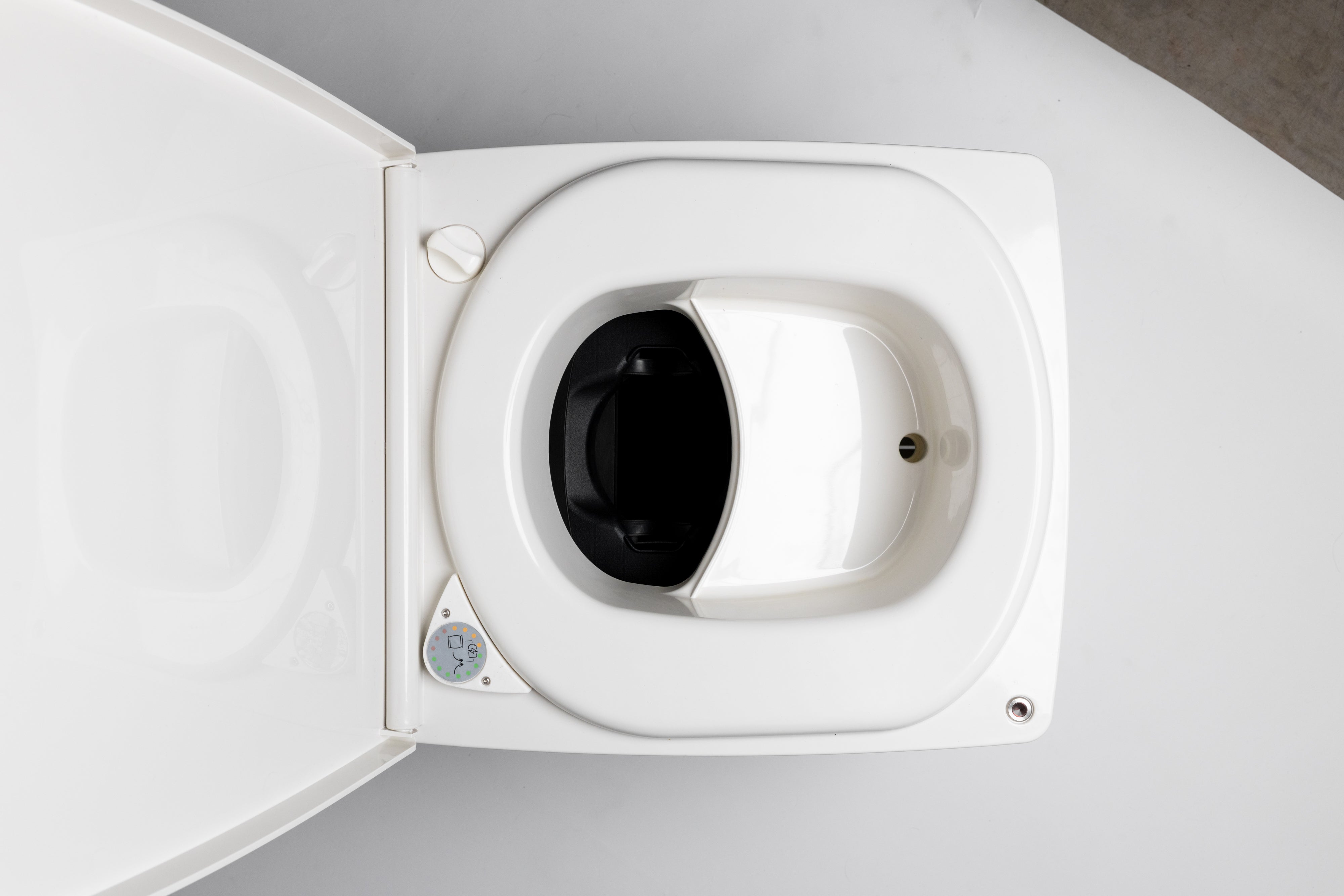 Portable S1 Dry Flush toilet by Compo Closet Australia featuring compact design and modern urination device for convenient outdoor use.