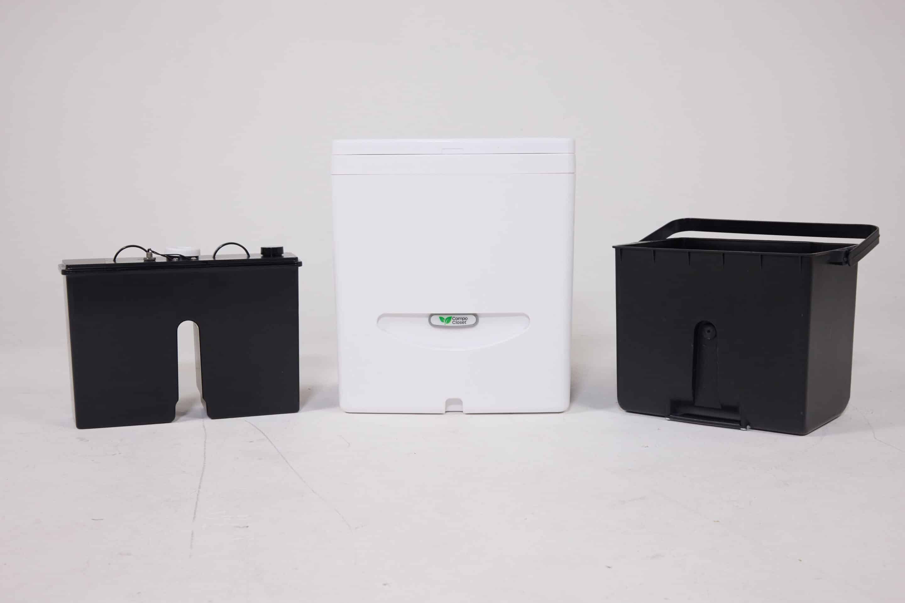 Cuddy™ Lite compost bin with liquids bottle and solids collection bin, designed for eco-friendly waste separation.