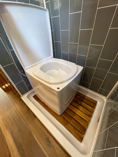 Portable Cuddy composting toilet by Compo Closet Australia, designed for caravan and off-grid living, featuring a compact, eco-friendly design.