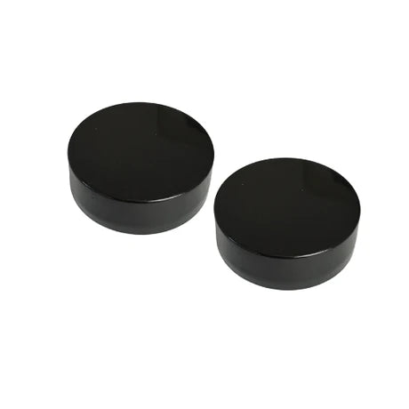 Two screw-on urine bottle caps by Compo Closet Australia, shown in a close-up image, designed for secure closure.